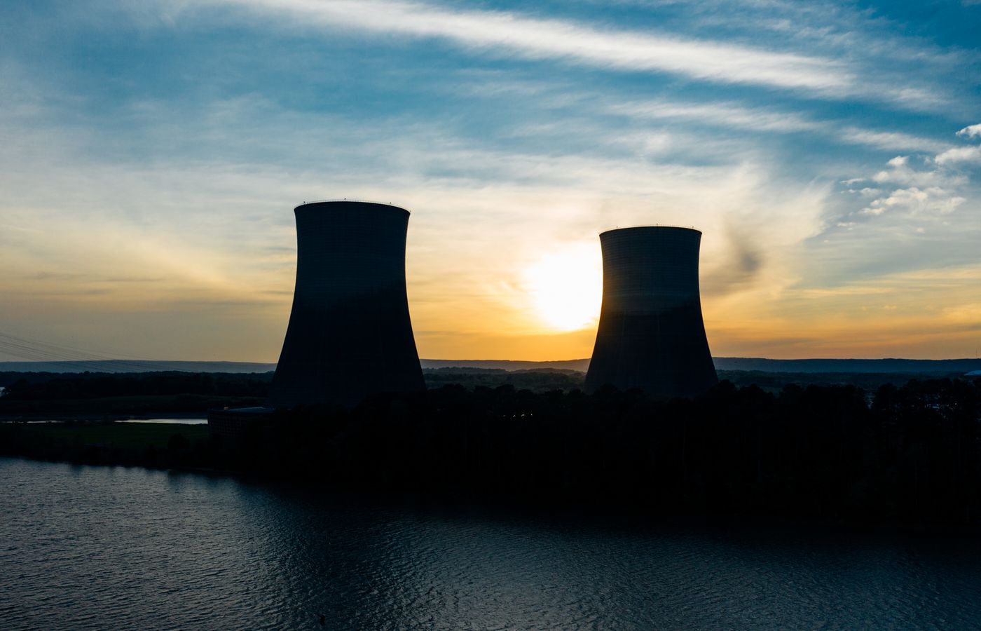 Power generation station cooling towers at sunset