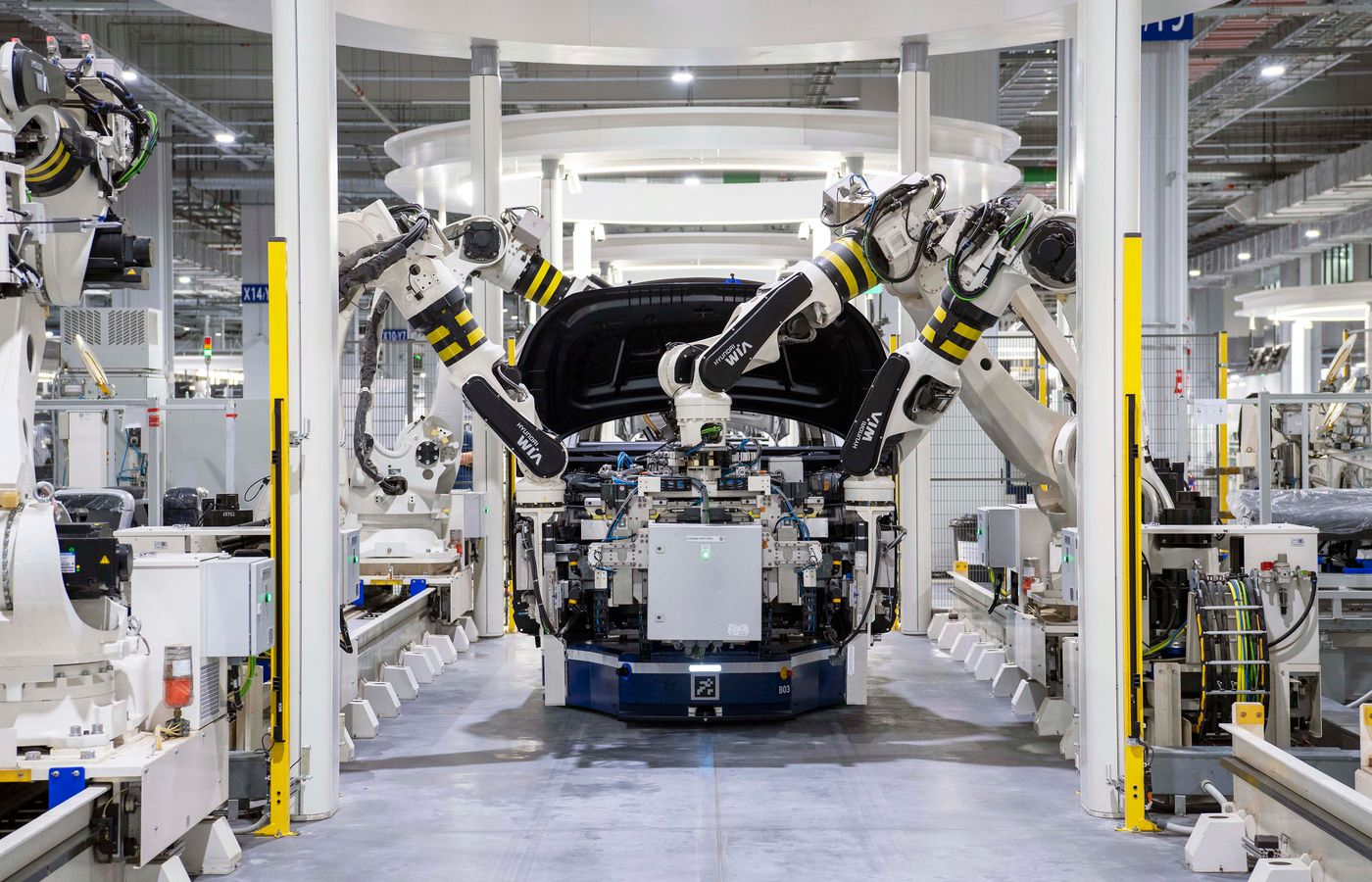 Robotic assembly line inside a manufacturing plant