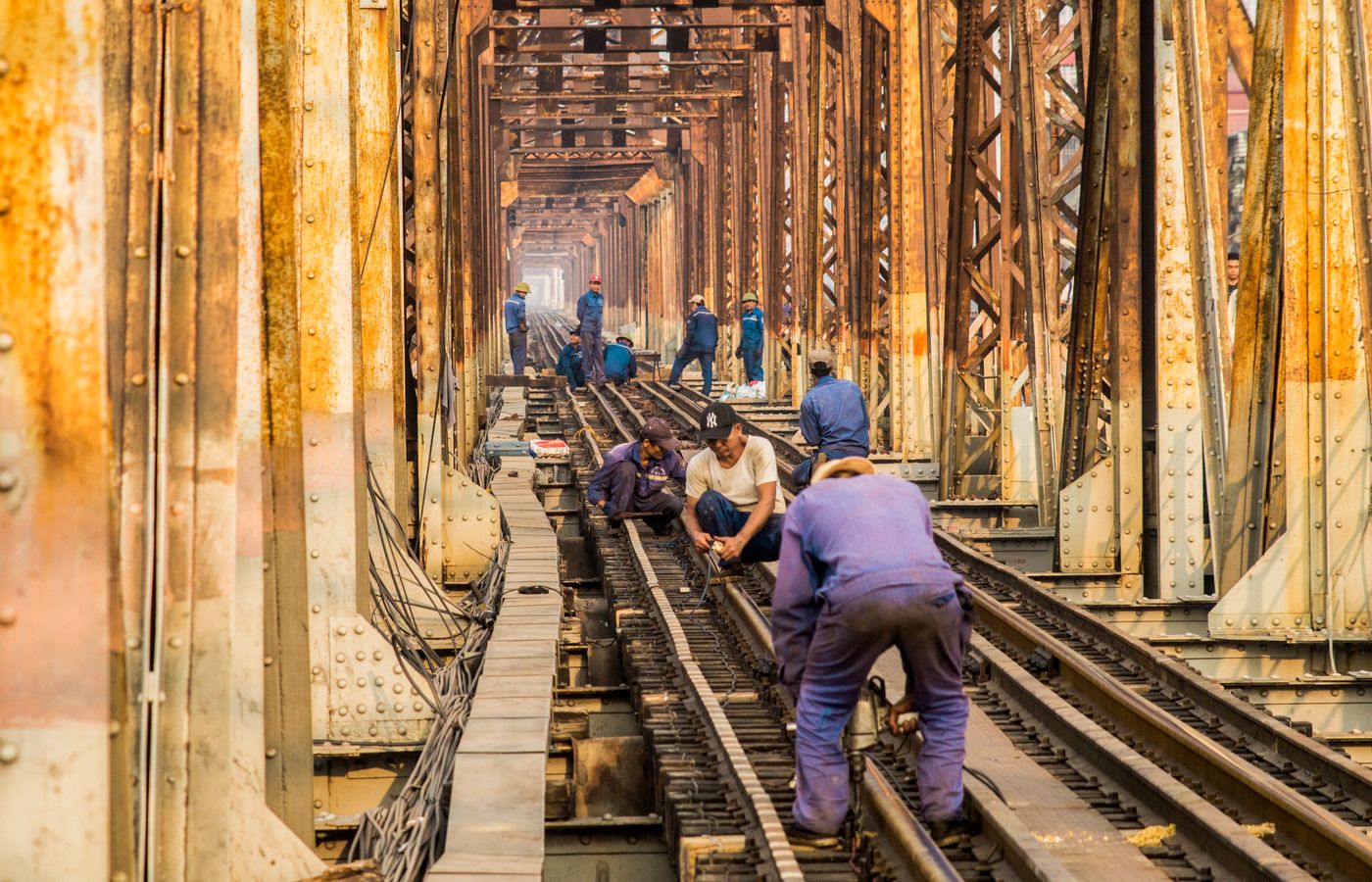 Crew constructing railroad track infrastructure