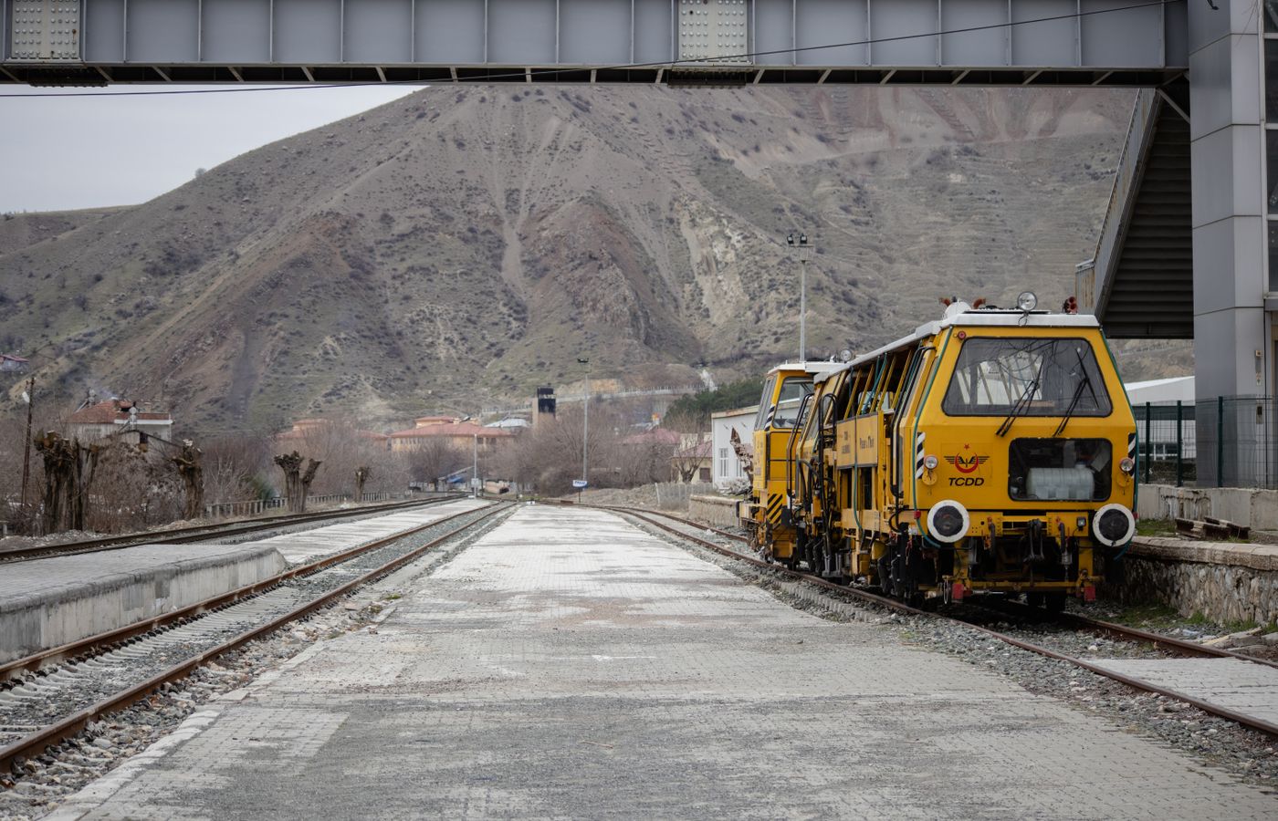 Track maintenance machinery working on railroad track