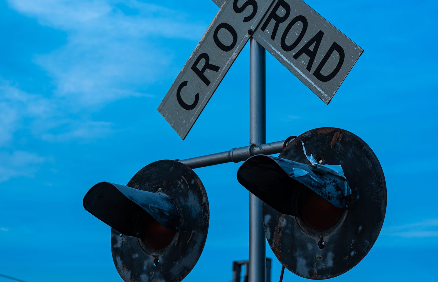 Highway rail grade crossing with crossbuck and warning signals